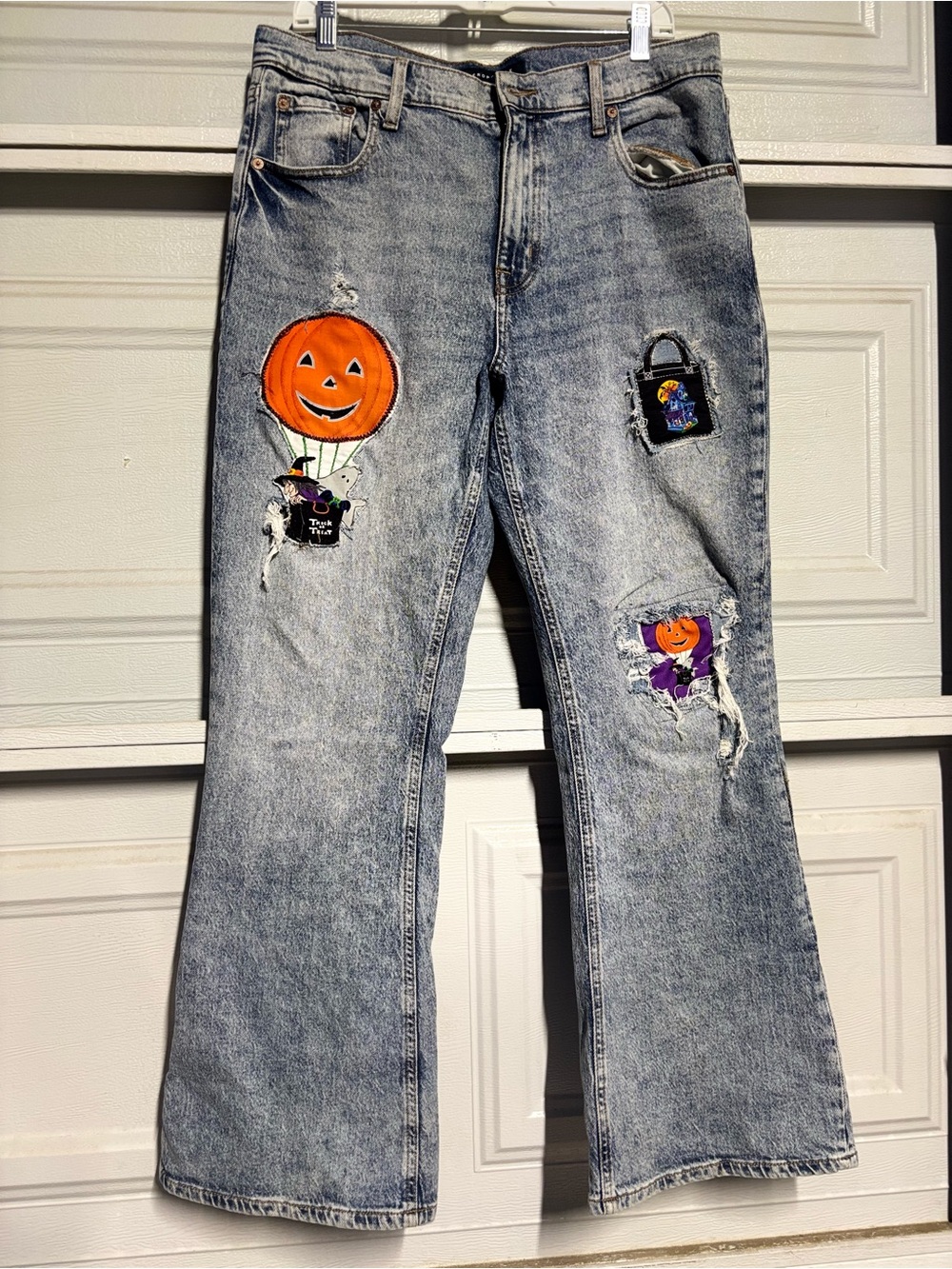 Aeropostale Light Wash Flare Jeans with Orange Pumpkin Patches